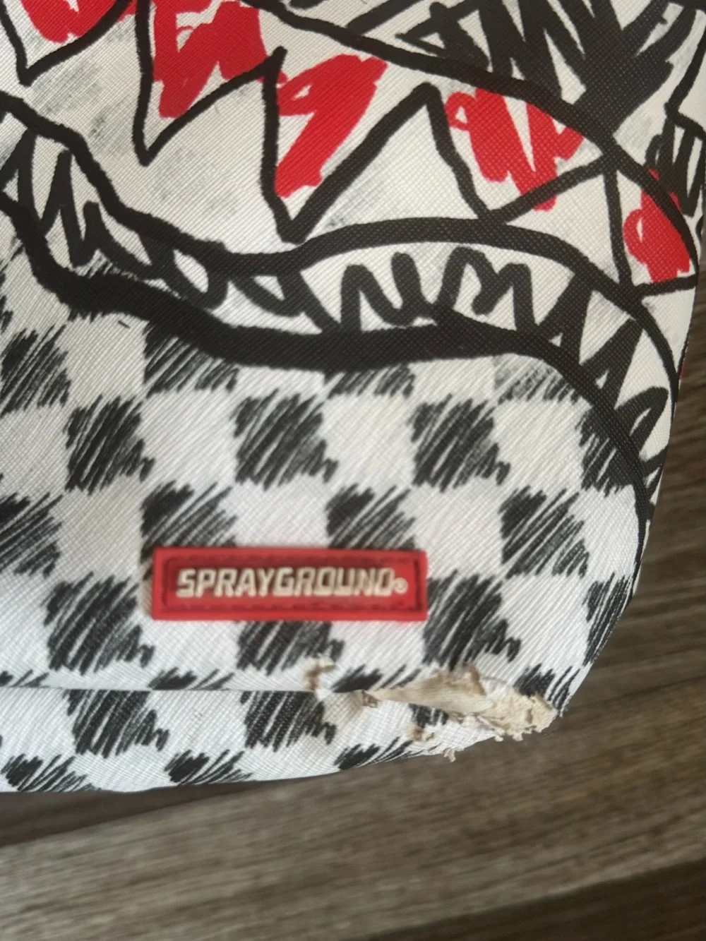 Sprayground Black, White & Red Shark Graphic Backpack